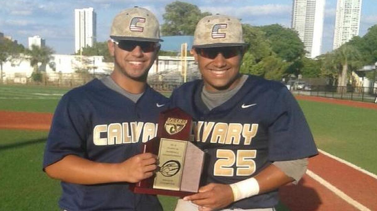 Victor Pimentel, left, and Max Guzman, who came through with back-to-back home runs in the fifth inning to lead Calvary Christian to a comeback win over SLAM Academy, pose after the game.