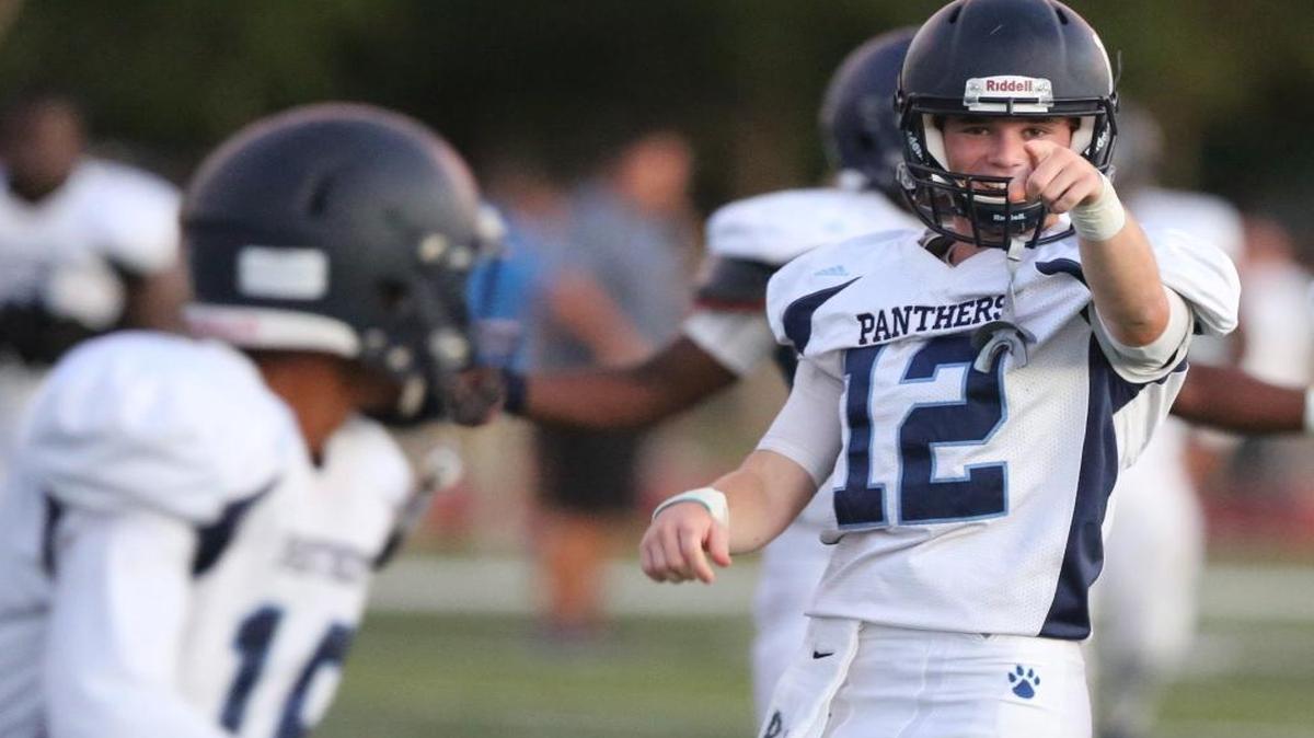 Palmetto High quarterback, Hugh Lowson, celebrates their victory over Belen Jesuit during the Region 4-8A high school football quarterfinal Friday afternoon, Nov. 11, 2016 at Belen. Palmetto came from behind in the fourth quarter to win the game 34-28.