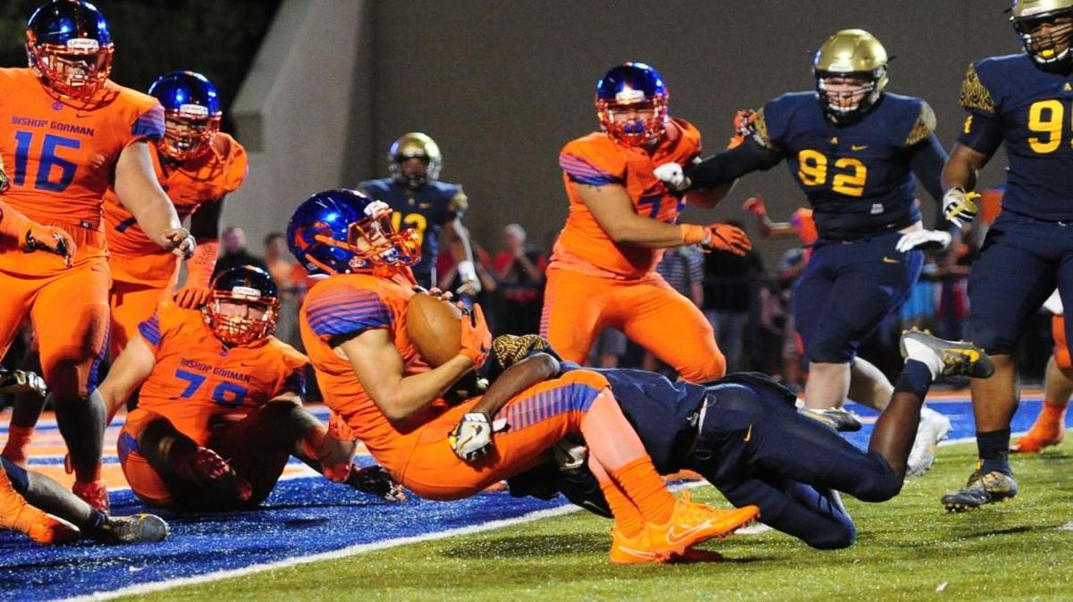 Bishop Gorman running back Biaggio Walsh scores the winning two-point conversion in triple-overtime to make St. Thomas Aquinas’ long trip home from Las Vegas a sad one.