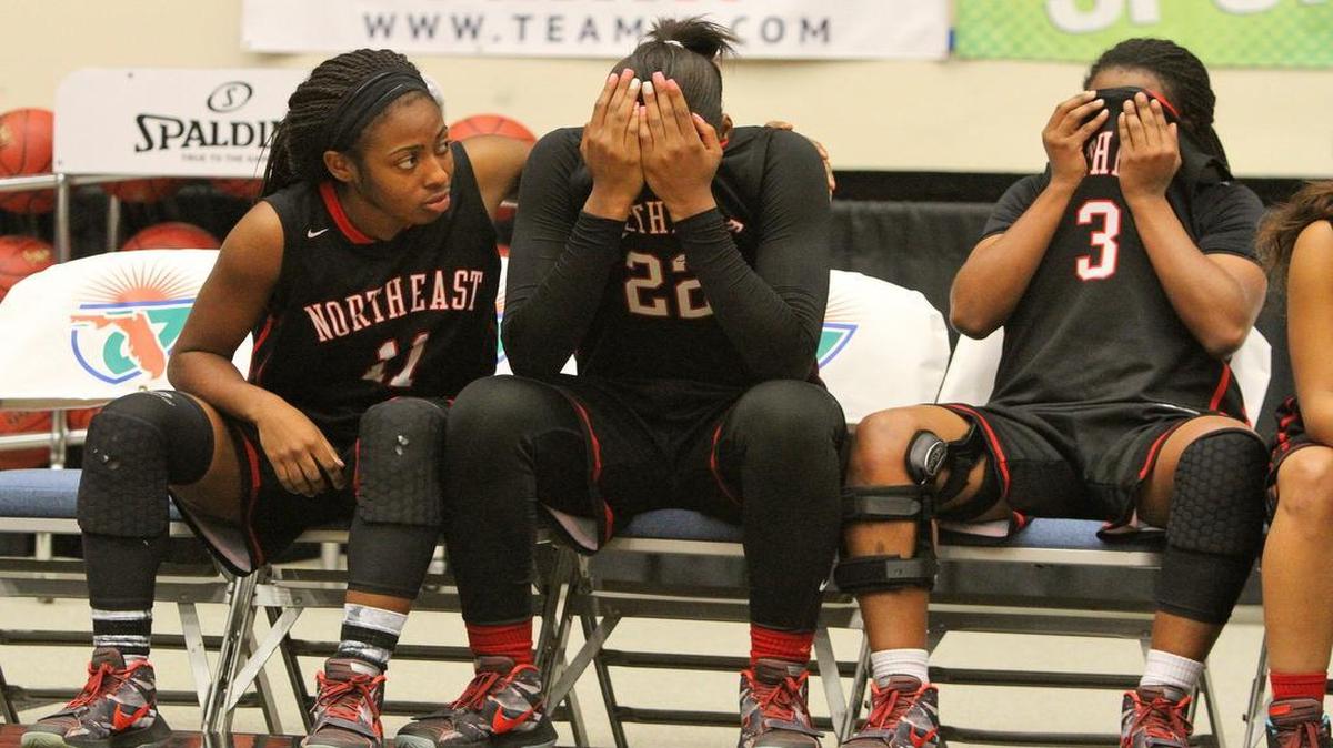 Northeast TaKyla Austin, Ashley Saintigene and Kandis Taylor suffer the title lose to Fort Myers during the FHSAA Girls 6A basketball finals Saturday February 20, 2016 in Lakeland, Florida. Northeast lost the title 60-45. Photos by Cindy Skop 2016.