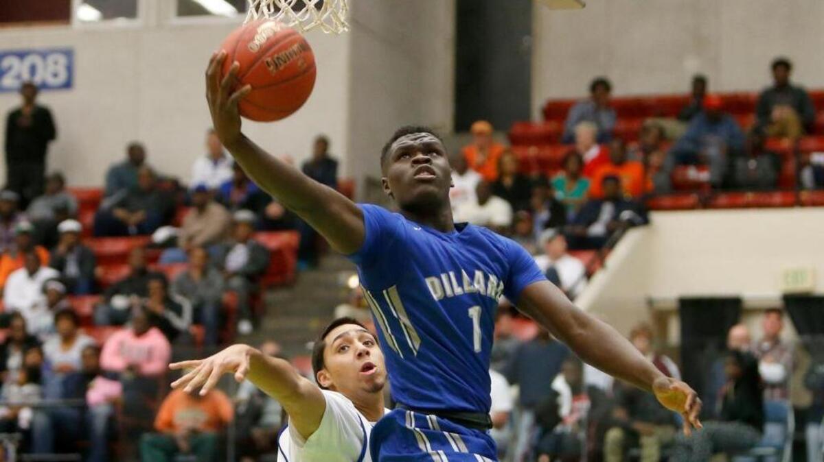 Dillard junior Jordan Wright lays up a shot during the Class 6A state semifinal against Deltona in Lakeland on Friday, Feb. 26, 2016. Wright had a game-high 19 points to go with 10 rebounds in the victory.