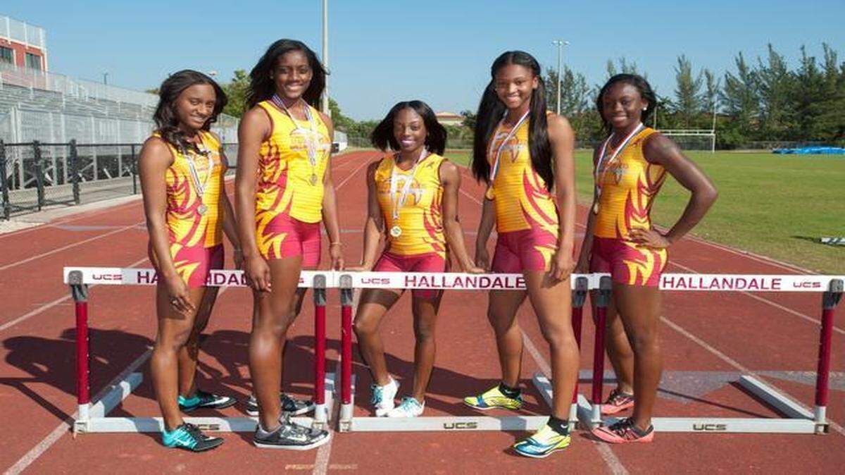
Hallandale track members, from left, Chanel Freeman, 17, Aisha Nelson, 18, Dariel Green, 16, Kimani Rushing, 16, and Lamisha Simmons, 18, give the Chargers a shot to win the Class 2A state title.
