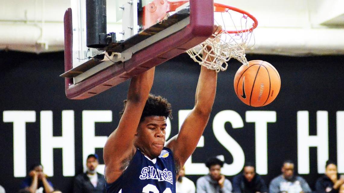 Vernon Carey throws down a dunk against Oak Hill Academy.