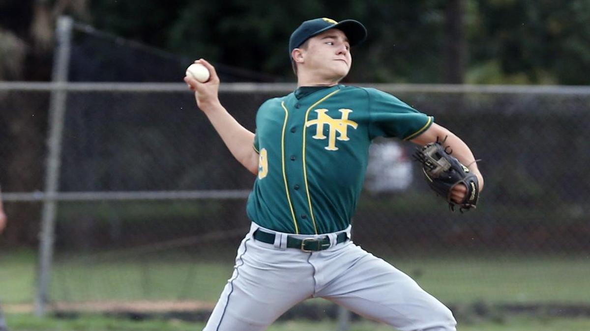 
Nova’s Vincent Coletti pitches against American in the high school baseball playoffs America High School, April 30, 2015.
