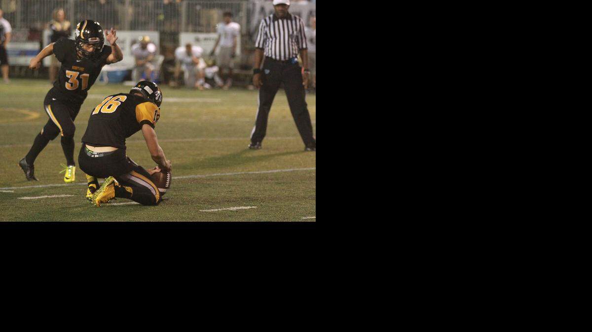 
Oren Milstein, (31) of American Heritage, kicks the winning goal from 38 yards with 4 seconds left in the game, Friday, Dec. 5, 2014, in their game against Orlando Bishop Moore at American Heritage High in Plantation.
