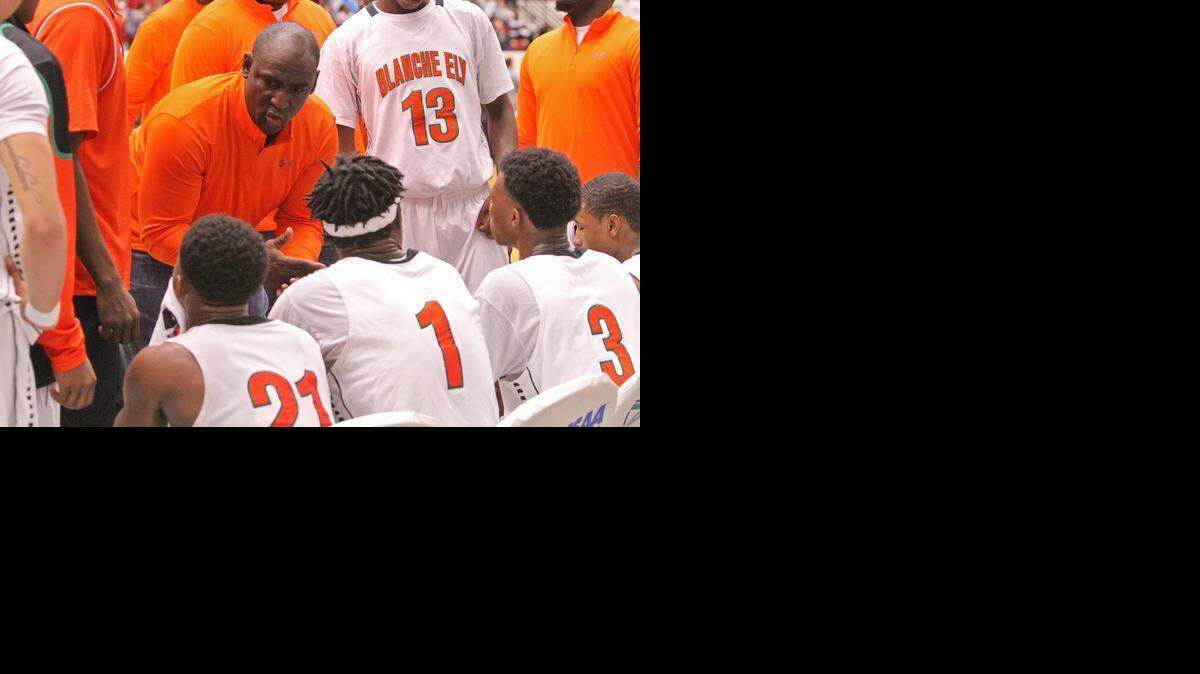 
Blanche Ely coach Melvin Randall speaks to his team during a game against Osceola in the Class 7A basketball championship Saturday, Feb. 28, 2015 in Lakeland, Fla. 
