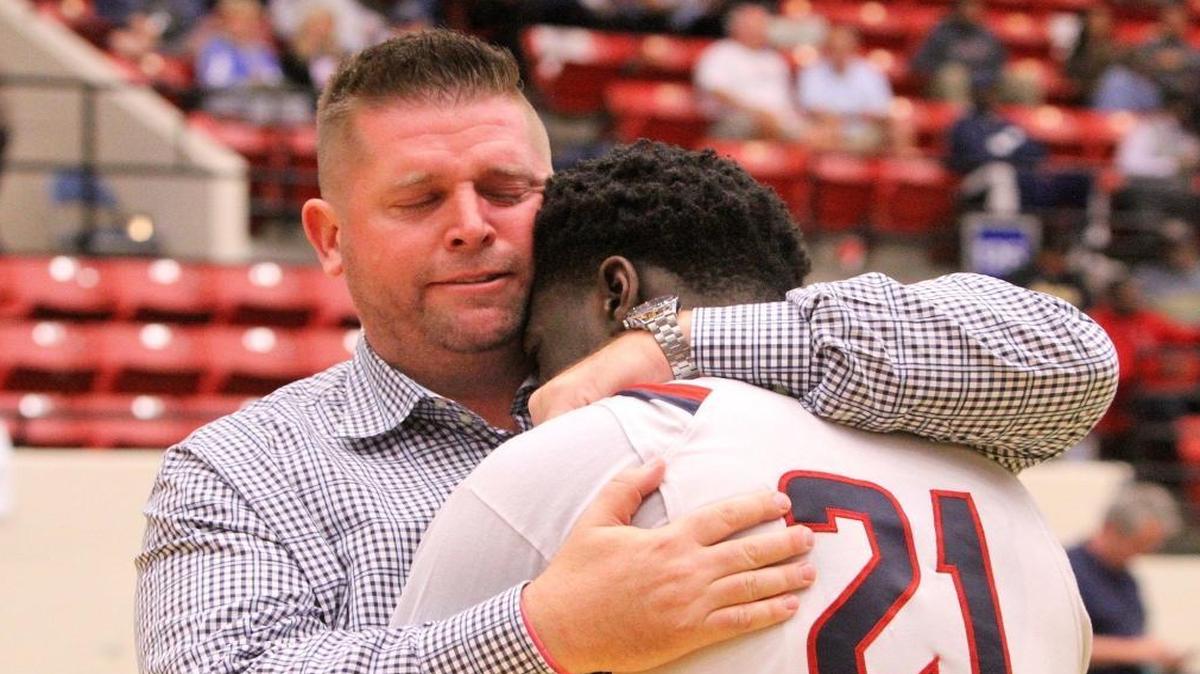 Westminster Academy coach Ehren Wallhoff and player Jerald Butler share tears at midcourt after losing to Windermere Prep 62-58 in the Class 3A boys’ basketball final Thursday, February 25, 2016 in Lakeland, Florida.