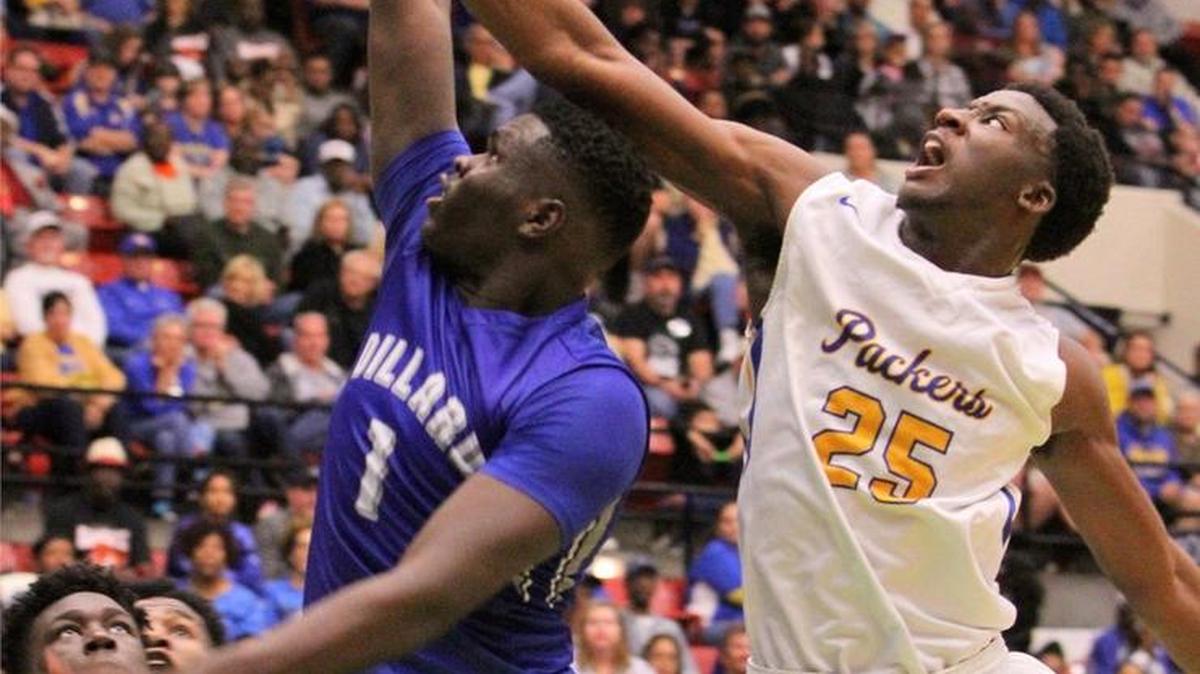 Dillard’s Jordan Wright (1) puts up a shot over the arm of Largo’s Brandon Drayton during Saturday’s state title game, in which he had 21 points and nine rebounds.