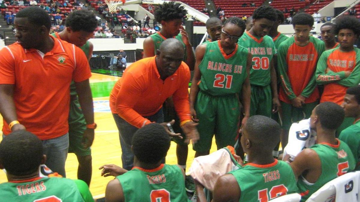 Blanche Ely coach Melvin Randall talks to his players during a timeout in a Class 7A state semifinal victory over Melbourne on Friday, Feb. 26, 2016 at The Lakeland Center in Lakeland, Florida.