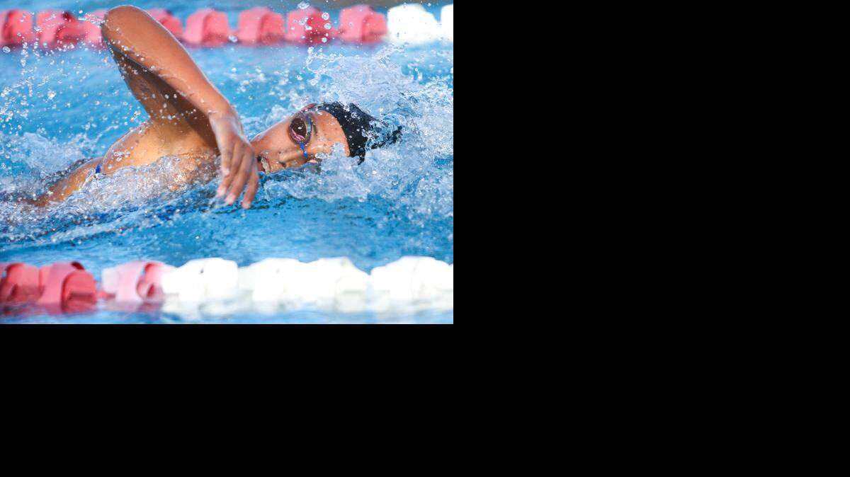 <cutline_leadin>Making a splash:</cutline_leadin> Doral Academy’s Nastassja Posso competes in the girls’ 200-yard freestyle during the Youth Fair Invitational on Saturday.