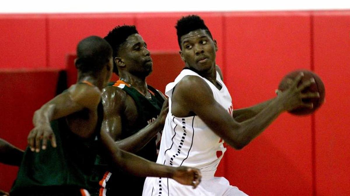 Zach Brown, right, makes a move while with Miami Beach, before he transferred to Miami High this season.