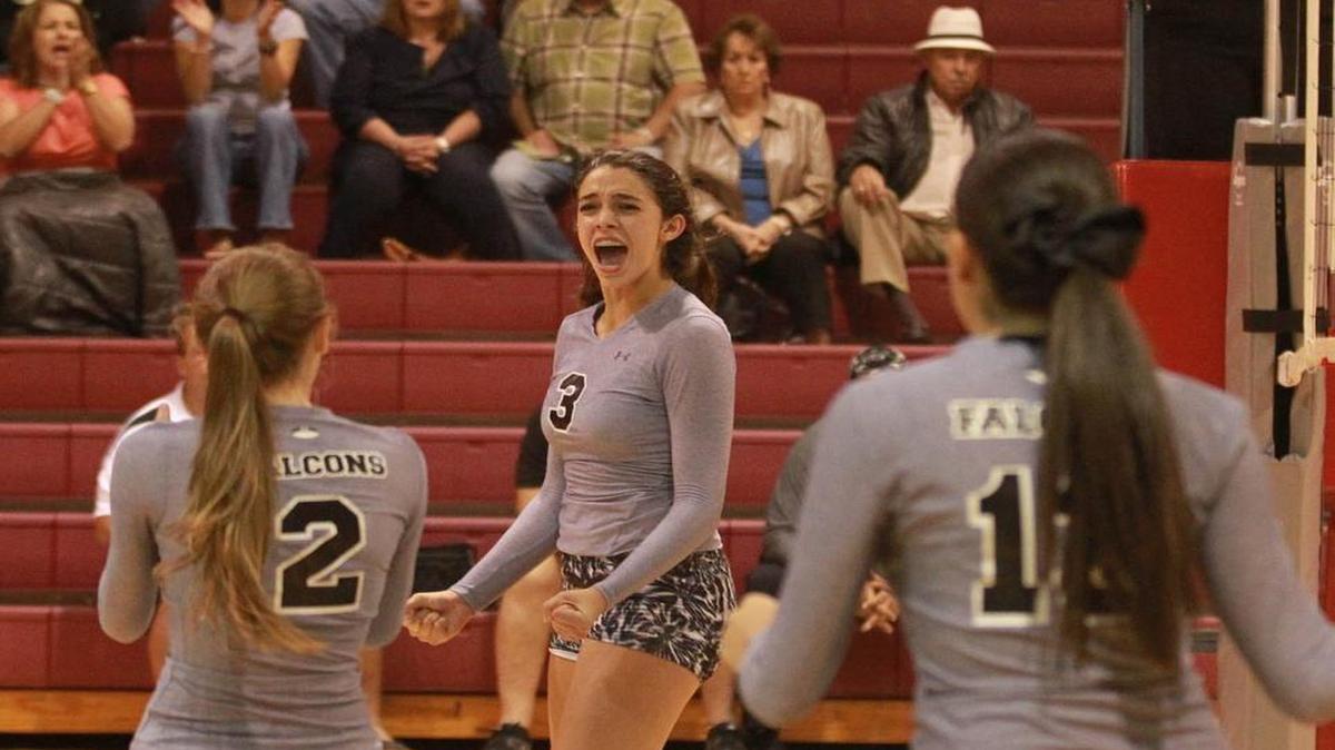 
Michelle Cuervo, center, a preseason All-American outside hitter by Prepvolleyball.com, and Ferguson are contenders for a state title.
