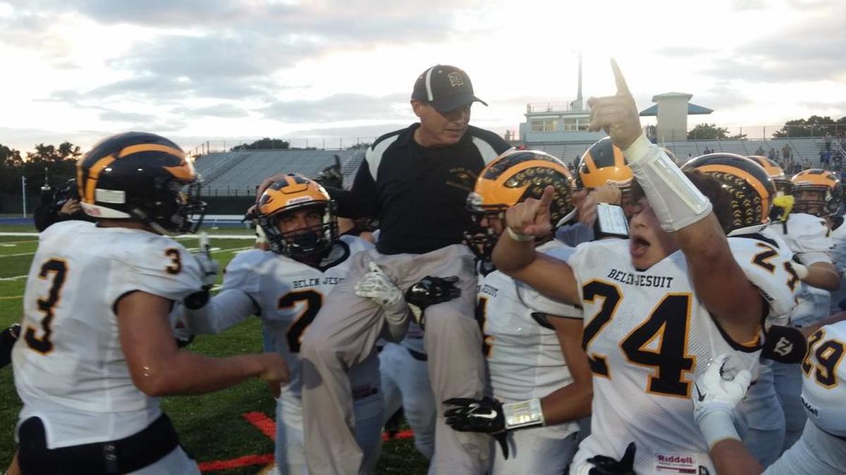 Belen coach Rich Stuart is carried off the field after getting the Miami-Dade record 214th win of his career Saturday.