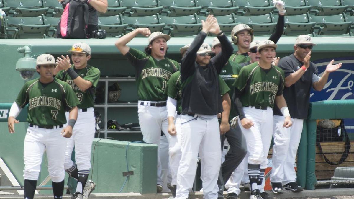 
Westminster players celebrate during the team’s three-run first inning. The Warriors can tie Key West for most state titles if they win Tuesday.
