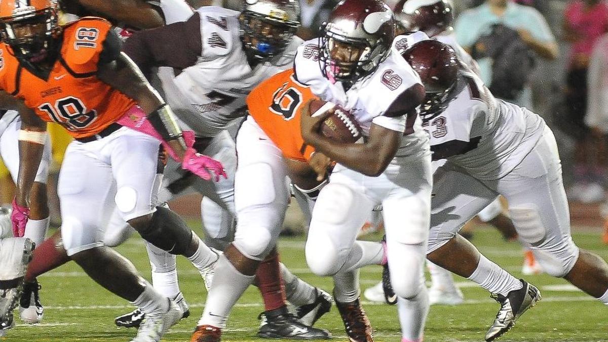 
Norland running back Chavis Wright carries the ball during first-quater action against Carol City on Friday, Oct. 16, 2015 at Traz Powell Stadium.
