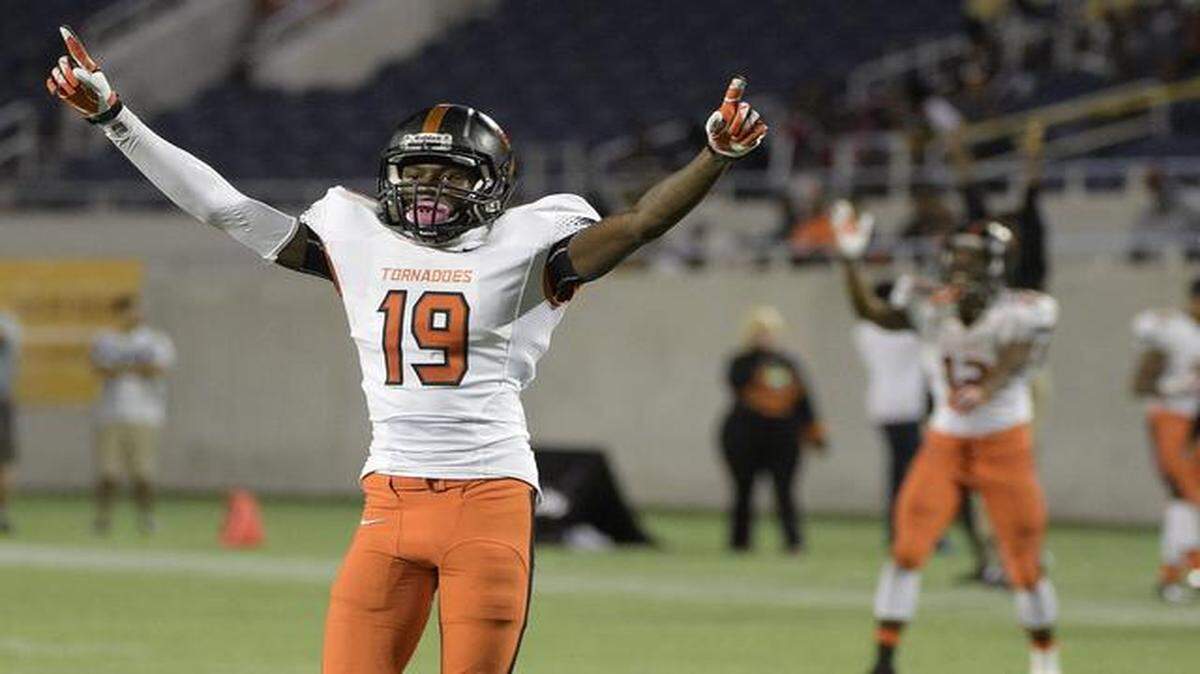 
Booker T. Washington receiver Vaquan Smalls celebrates after his team scored a touchdown in the second half of Saturday’s win.
