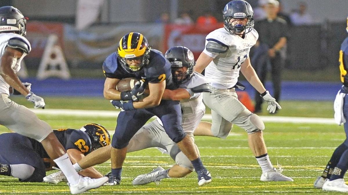 Fullback Javier Hernandez of Belen Jesuit tries to break a tackle during a game against Columbus on Saturday, Sept. 24, 2016. On Saturday, Oct. 8, 2016, Hernandez scored a touchdown to give Belen a lead against Keys Gate, but Belen couldn’t hold on and lost to Keys Gate on a late touchdown pass.