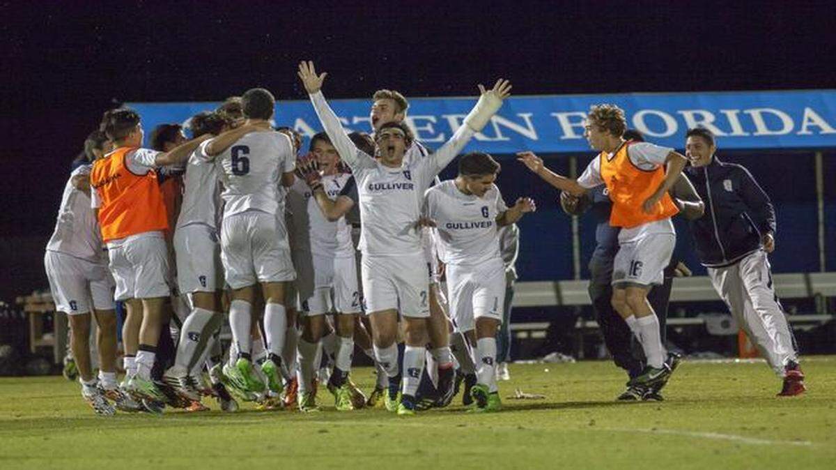 
The Gulliver Prep Raiders celebrate after winning the Class 2A state boys soccer championship game.
