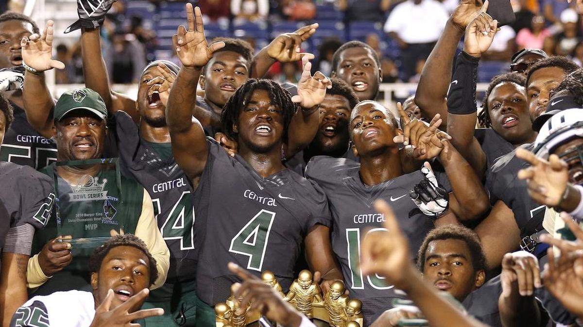 
Central celebrates after defeating Bothell High in the Burger King State Championships Bowl Series at FAU Stadium in Boca Raton, Florida, Dec. 27, 2014.
