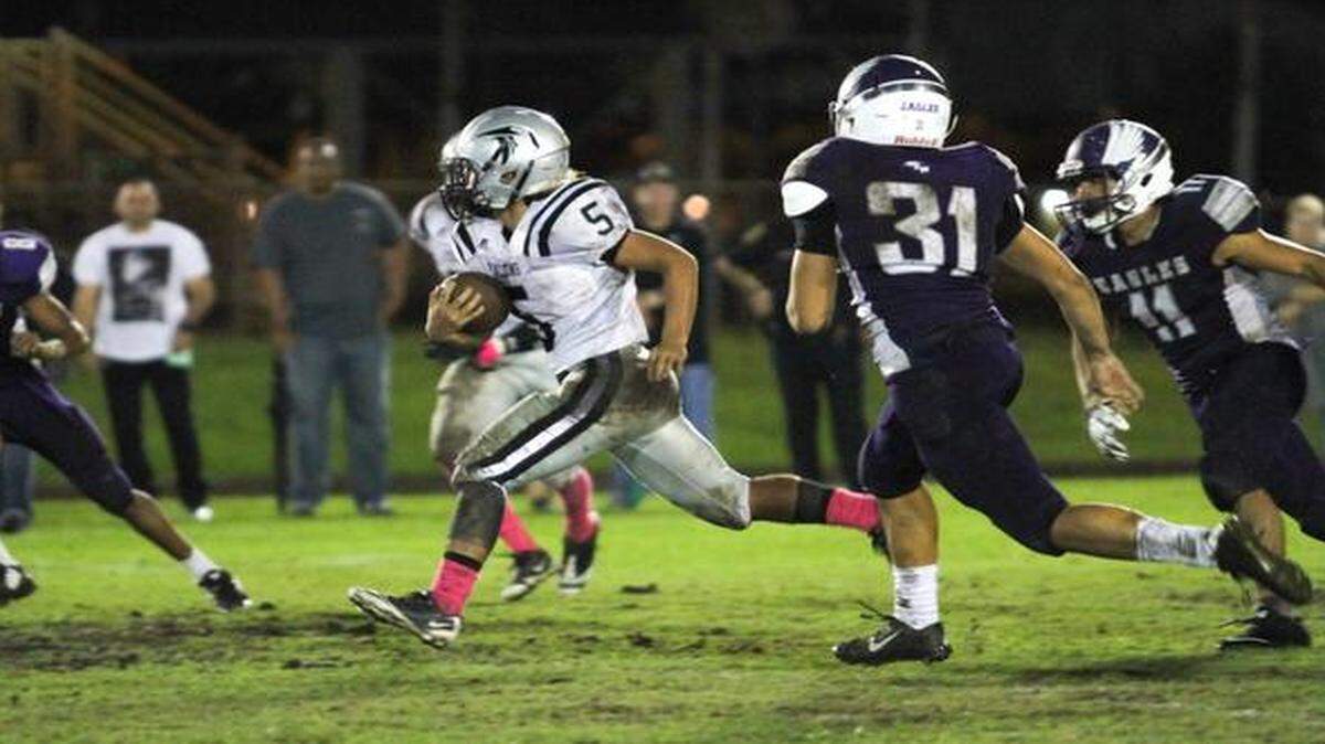 
Running back Anthony Moscoso of Ferguson High runs across the field during the Friday night game against Southwest.
