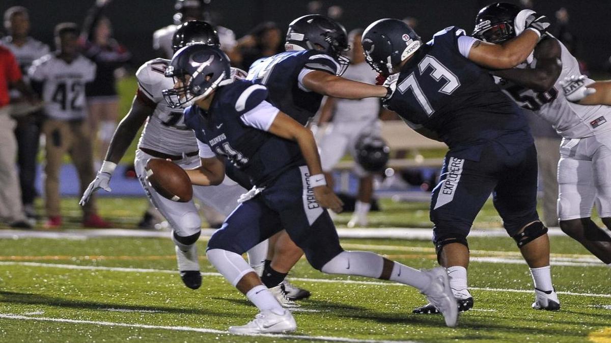 Columbus backup quarterback Nick Gonzalez scrambles during a game on Sept. 9, 2016. He threw a touchdown pass in the second half of a 49-6 victory over Miami Beach on Oct. 14, 2016.
