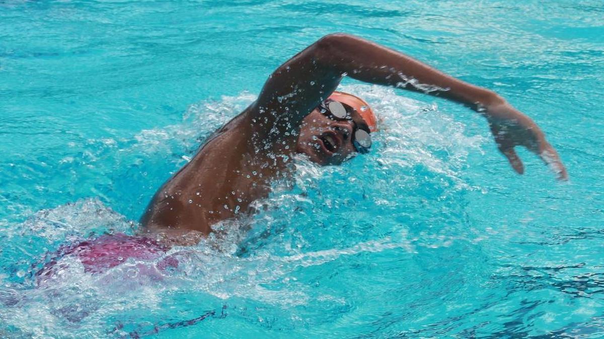 Braddock’s John Torres swims to victory in the boys’ 500 freestyle during the GMAC championships at the Miami Dade College North Campus aquatic center on Thursday.