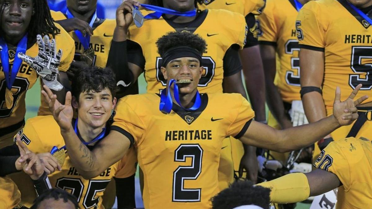 American Heritage cornerback Patrick Surtain II (2) celebrates after the Patriots captured the Class 5A State High School Football Championship on Dec. 8, 2017.