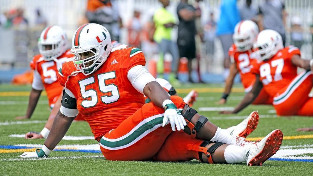 Miami offensive lineman Navaughn Donaldson stretches during the past season. Donaldson, a freshman All-American listed at 6-6 and 350 pounds, played tackle in high school, and a return to that position at UM is possible.