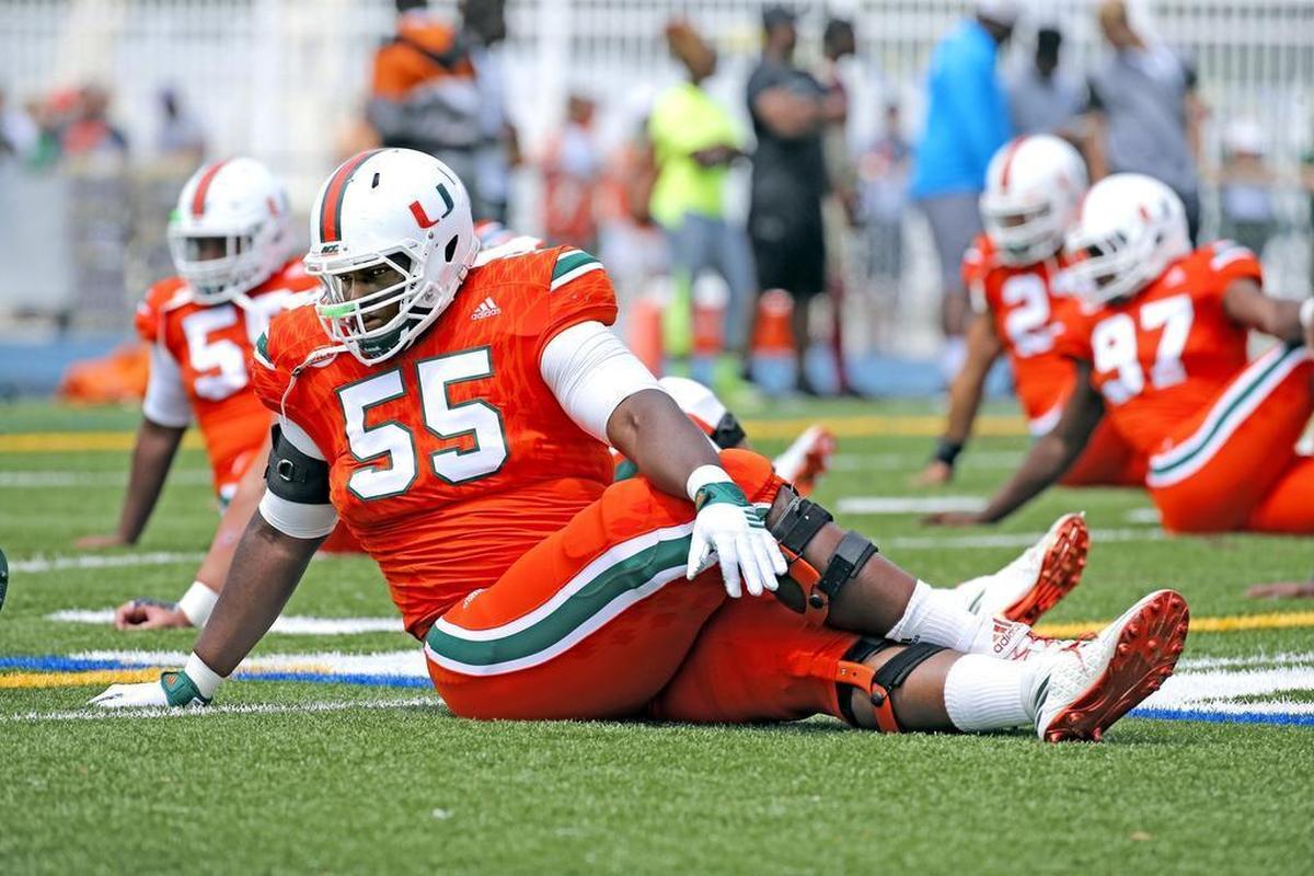 Miami offensive lineman Navaughn Donaldson stretches. UM switched Donaldson from guard to tackle for this season, but might switch him back to guard.