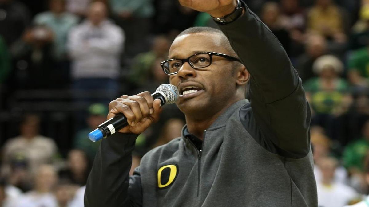 Oregon's new head football coach Willie Taggart acknowledges the crowd after being introduced during the Alabama vs. Oregon men's NCAA college basketball game Sunday, Dec. 11, 2016, in Eugene, Ore. Coaches at Miami Southridge told the Miami Herald that senior safety Billy Gibson is expected to land at Oregon with Taggart.
