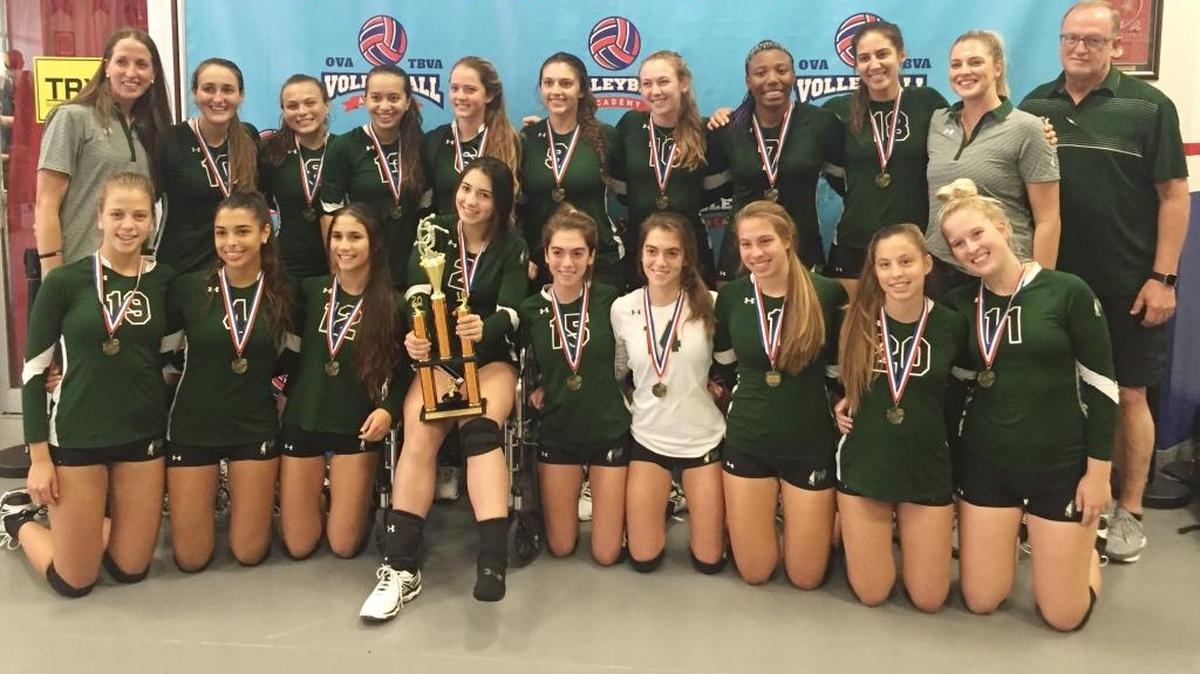 The Westminster Christian girls’ volleyball team poses with the trophy after winning the Orlando, Tampa Bay Volleyball Academy Winter Park Showcase on Saturday afternoon.