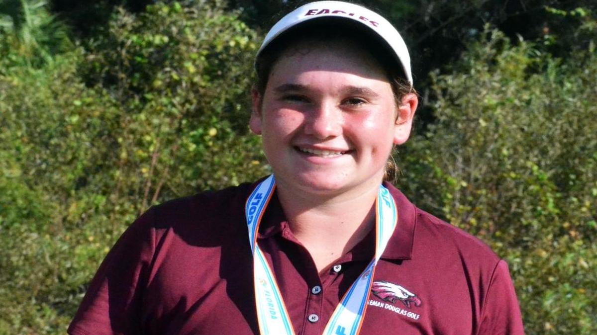 Douglas freshman Taylor Roberts smiles with her third-place Class 3A girls’ golf state finals medal at Mission Inn and Resort on Wednesday, Oct. 26, 2016, in Howey-in-the-Hills, Florida.