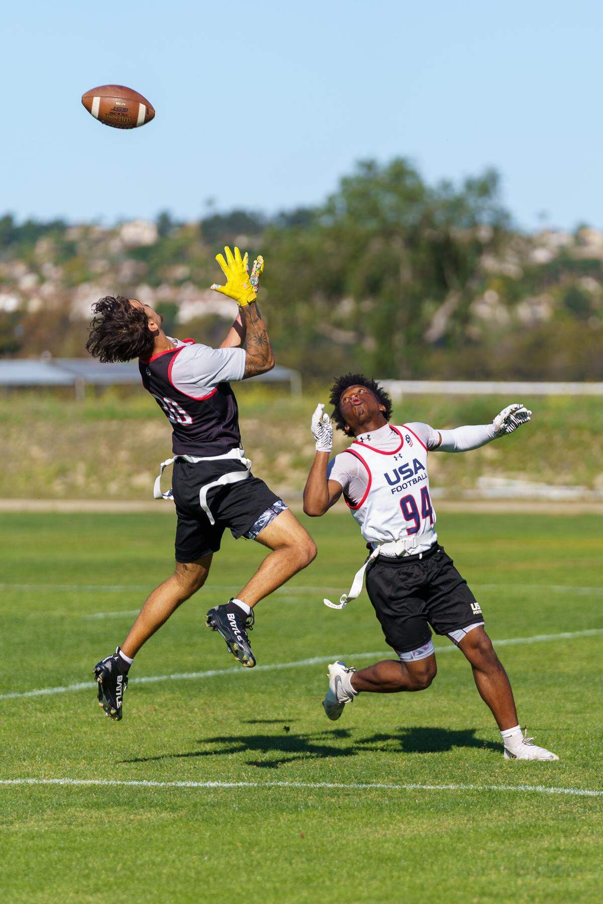 Monarch’s Christopher Cortinas (left) of USA Flag Football.