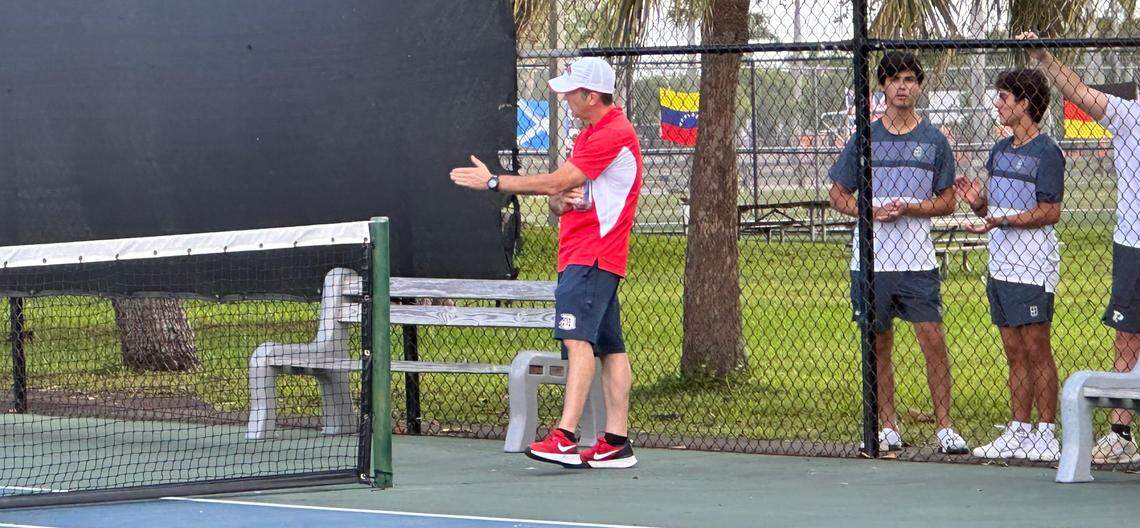Coach Justin Puppo of the region champion Doral Academy boys’ tennis team.