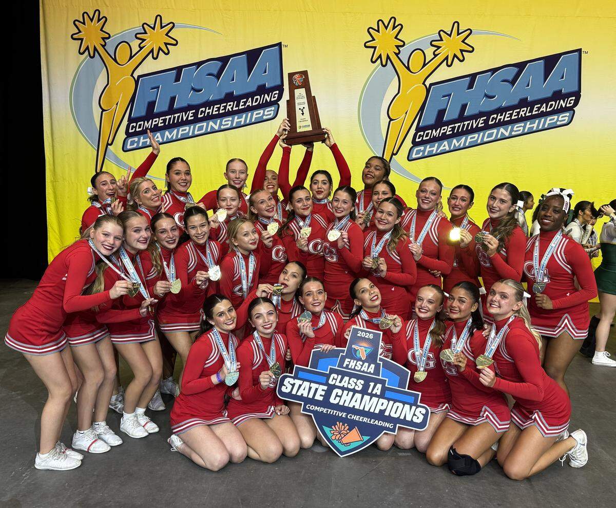 The state champion Cardinal Gibbons competitive cheerleading team. 