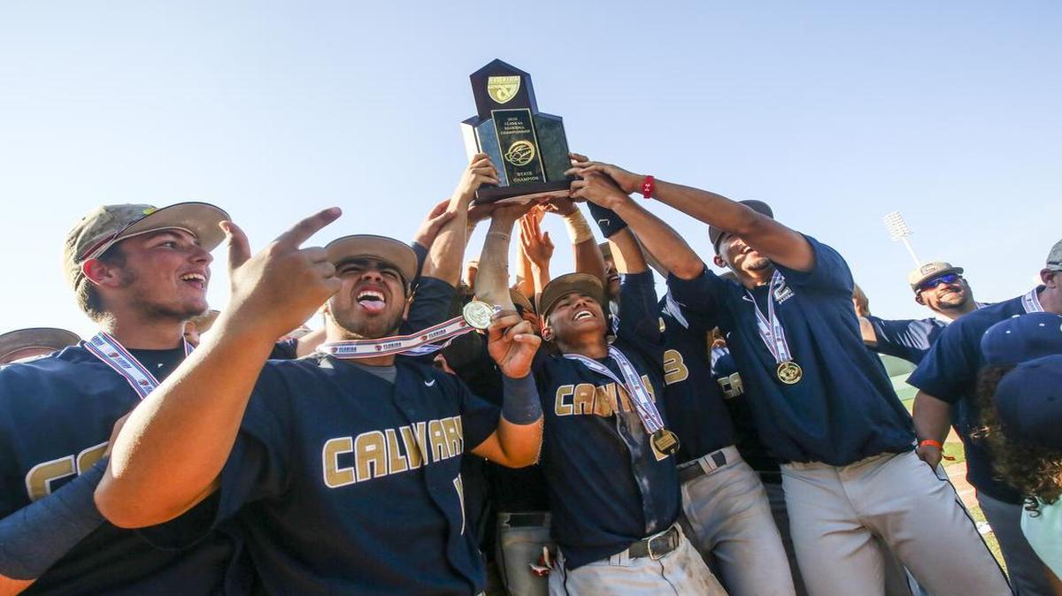 Bishop Verot lost to Calvary Christian Academy in their Class 4A final game 12-1. Calvary celebrates their win and took turns kissing the trophy.