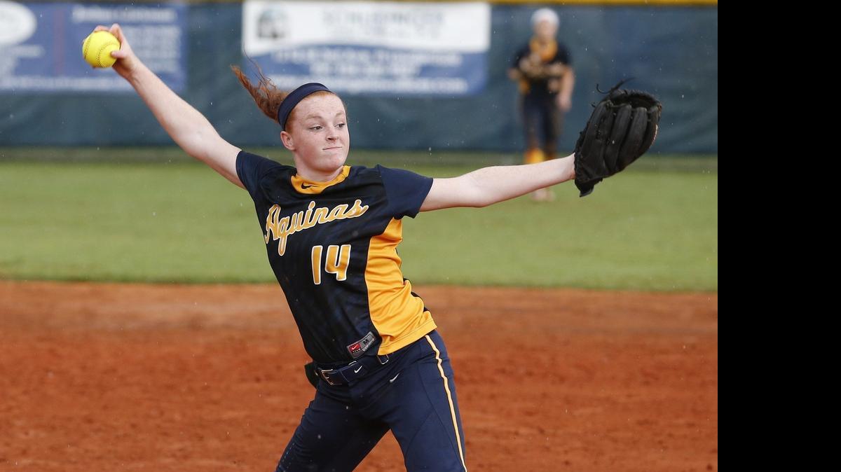 
St. Thomas Aquinas’ Brooke Stock pitches against host American High in a Region 4-7A softball semifinal Tuesday, April 28, 2015.
