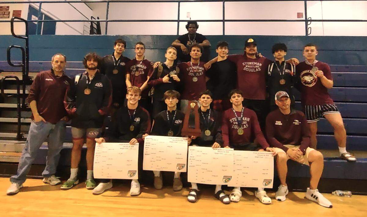 The district champion Stoneman Douglas wrestling team.