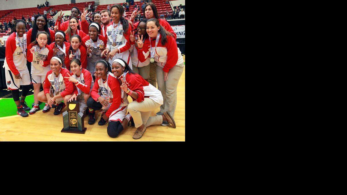 
Miami Country Day players celebrate their title win over Seffner Christian Academy in the FHSAA Girls’ Class 3A championship at The Lakeland Center on Wednesday, Feb. 18, 2015 in Lakeland. 
