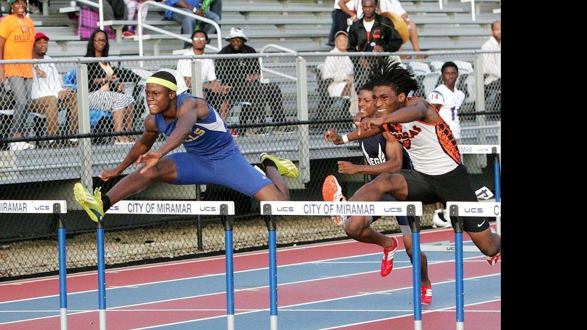 
Northwestern’s Thomas Burns wins boys 110 meter hurdles during the FHSAA Class 3A, Region 4 Track and Field Championship on Thursday, April 23, 2015 at Ansin Sports Complex in Miramar
