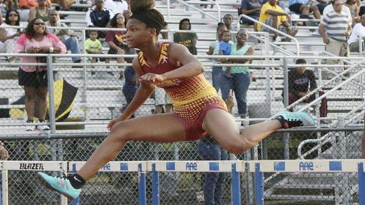 
Hallandale High’s Kimani Rushing wins the girls’ 100-meter hurdles during the BCAA Track and Field Championships on Saturday, March 21, 2015 at Dillard High School in Fort Lauderdale.
