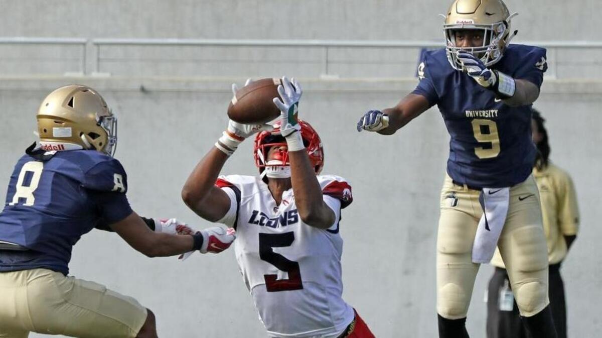 Champagnat defensive end Gregory Rousseau (5) is expected to be one of the at least 13 commitments expected to sign with the Miami Hurricanes on Wednesday.
