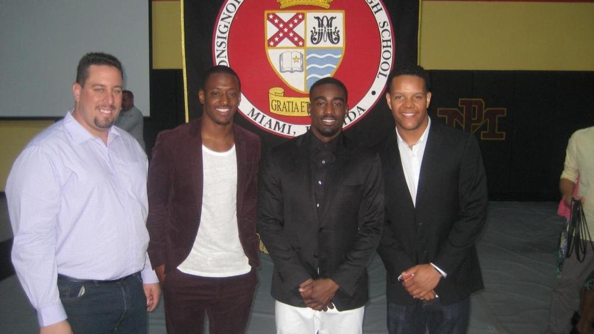 From left: Joel Rodriguez, DeMarcus Van Dyke, Kayvon Webster and Stephen Morris pose during a ceremony in their honor Wednesday, March 16, 2016, at Monsignor Pace High School.