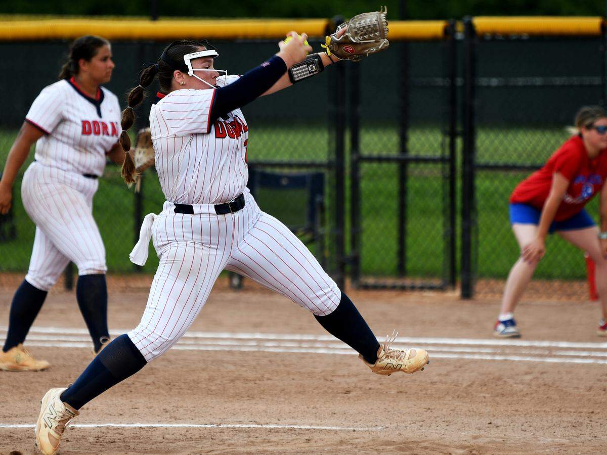 Doral Academy senior pitcher Meagan Villazon delivers a pitch against defending state champions Pace on Saturday at Solider’s Creek Park in Longwood. She pitched a one-hitter and won 1-0.
