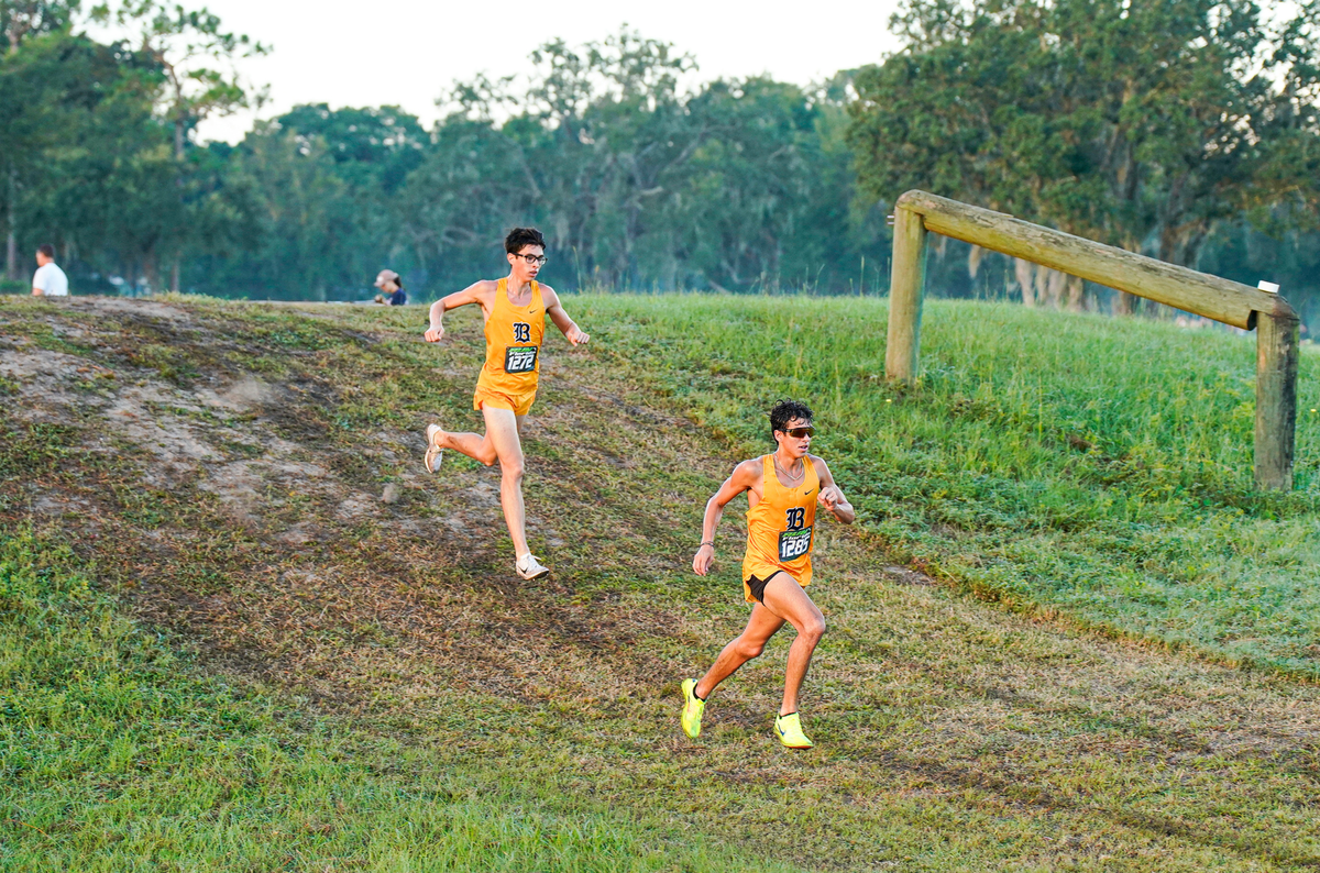 Belen Jesuit standout runners (from left) Armando Cruz and Marcello Montecon.