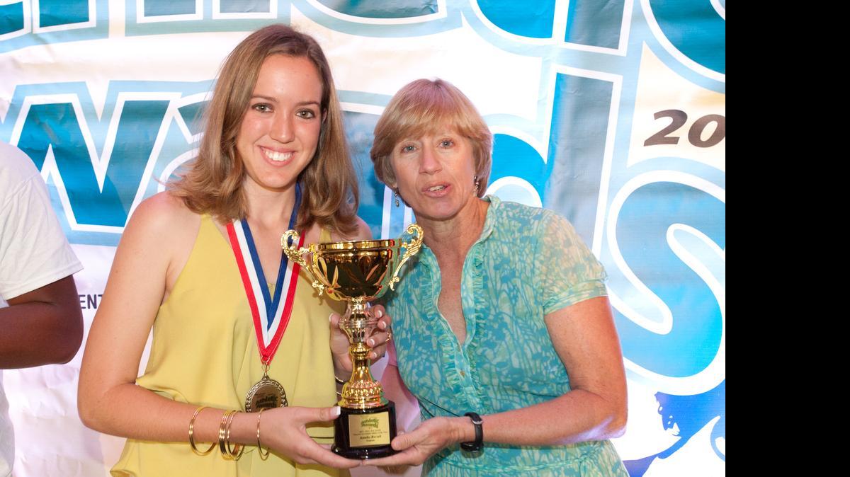 
Ferguson High volleyball and track athlete Annika Reczek is presented the 8A-6A Athlete of the Year award by Miami Herald columnist Linda Robertson during the All-Dade athletic awards ceremony at Jungle Island, Wednesday, May 21, 2014, in Miami.
