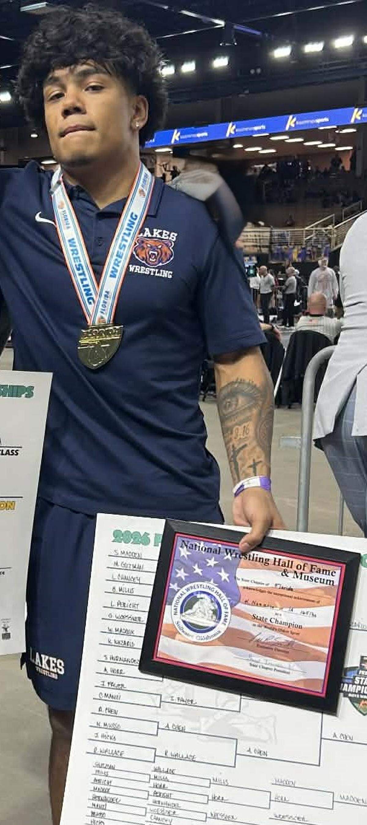 Undefeated state champion wrestler Kalias Nazario of state champion Mater Lakes Academy.