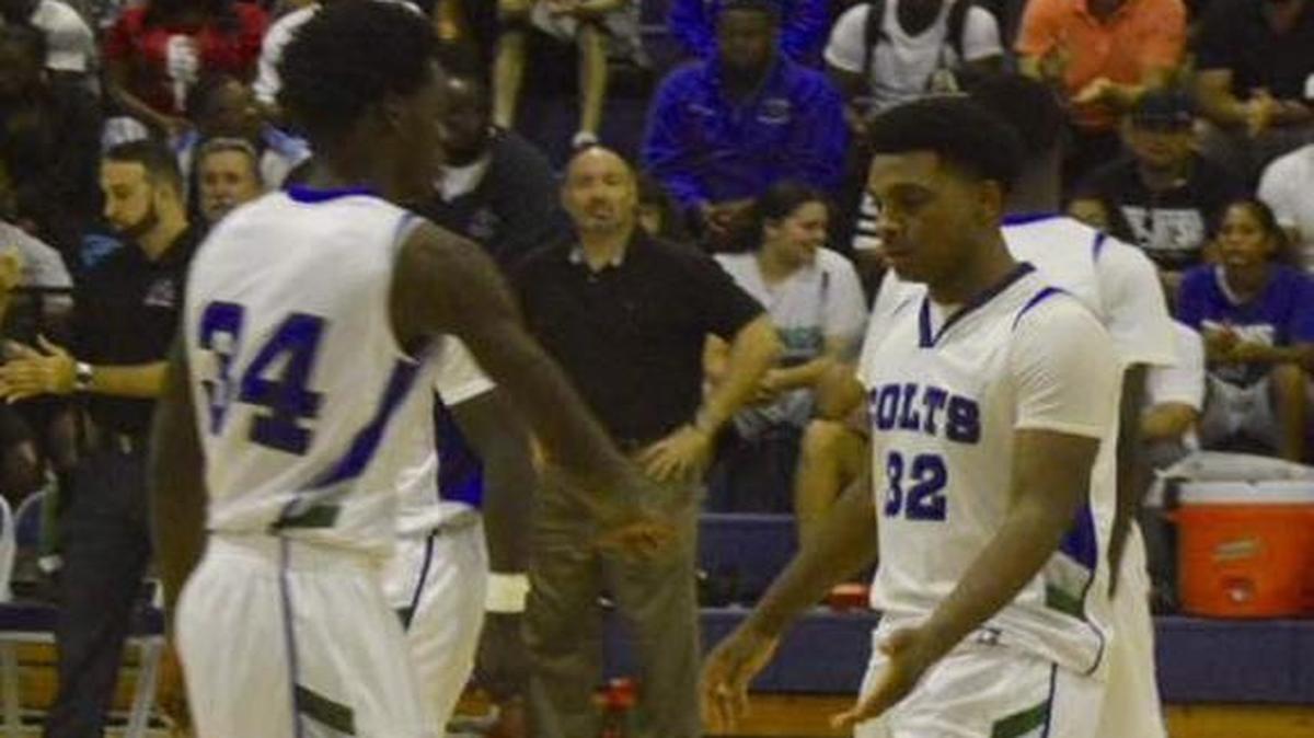 Myron Dewar, right, is the all-time scoring leader in Coral Springs’ 40-year history.