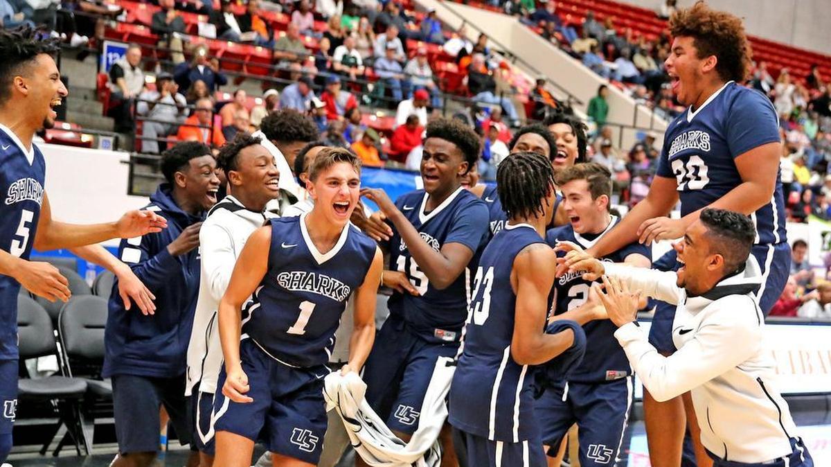 University School celebrates as the clock counts down to zero and they defeat Ocala Trinity Catholic in the 5A Finals Boy’s 2018 Basketball State Championships in Lakeland, Florida, March 8, 2018. University School won 80-40.
