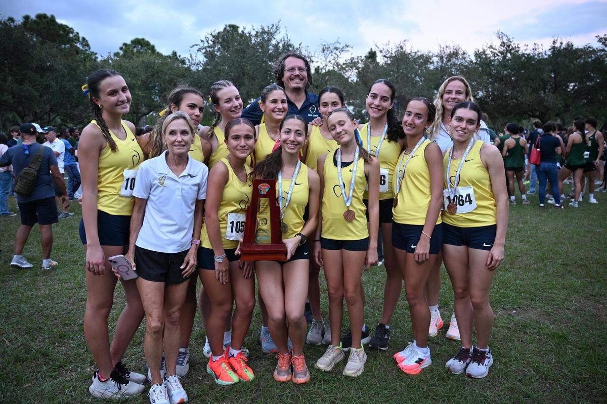 The Carrollton girls’ cross-country team won a district title.